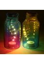 Kolorowa dekoracja LED w soiku z korkow przykrywk